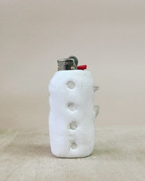 White textured lighter on a beige background