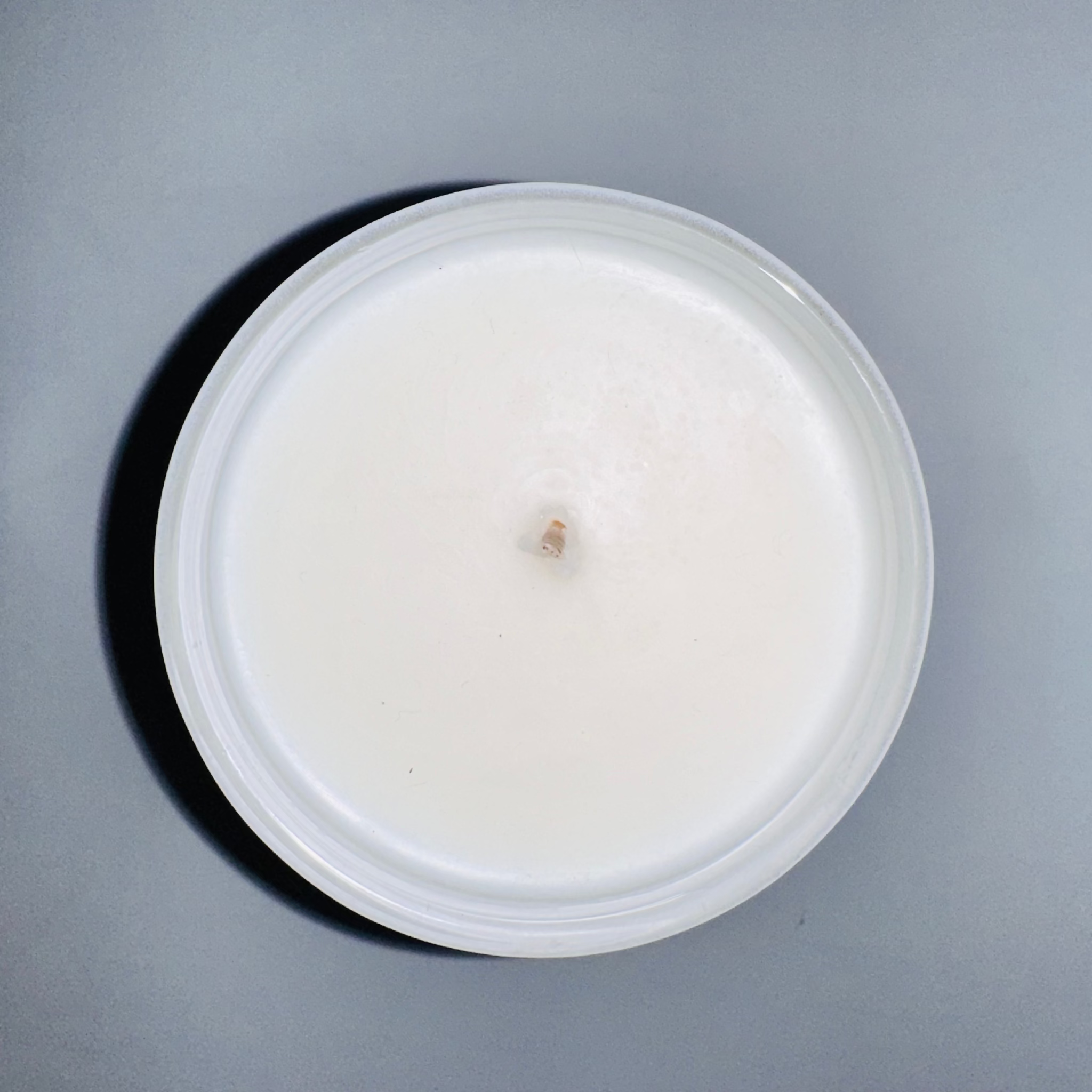 top of san maris candle showing wick